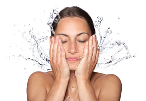 a women using superfood face wash