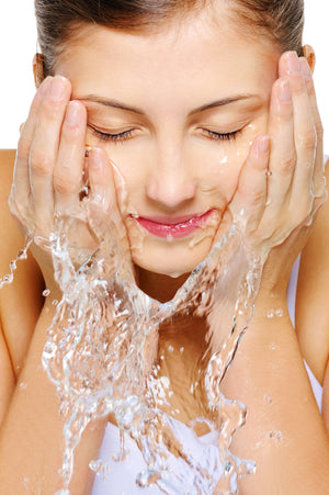 women mouthwash with organic facial moisturizer