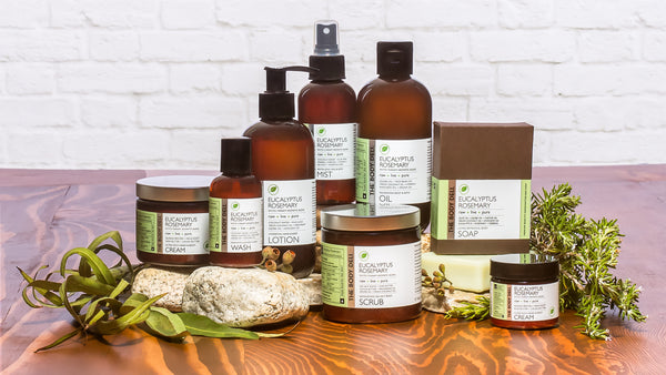 A selection of organic skin care products displayed on a rustic wooden table, showcasing natural beauty and wellness.