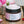 A luxurious body cream, The Body Diet Rose Absolute, showcasing its elegant packaging and rich texture for skin nourishment.