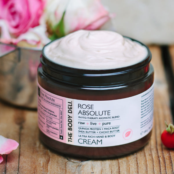 A luxurious body cream, The Body Diet Rose Absolute, showcasing its elegant packaging and rich texture for skin nourishment.